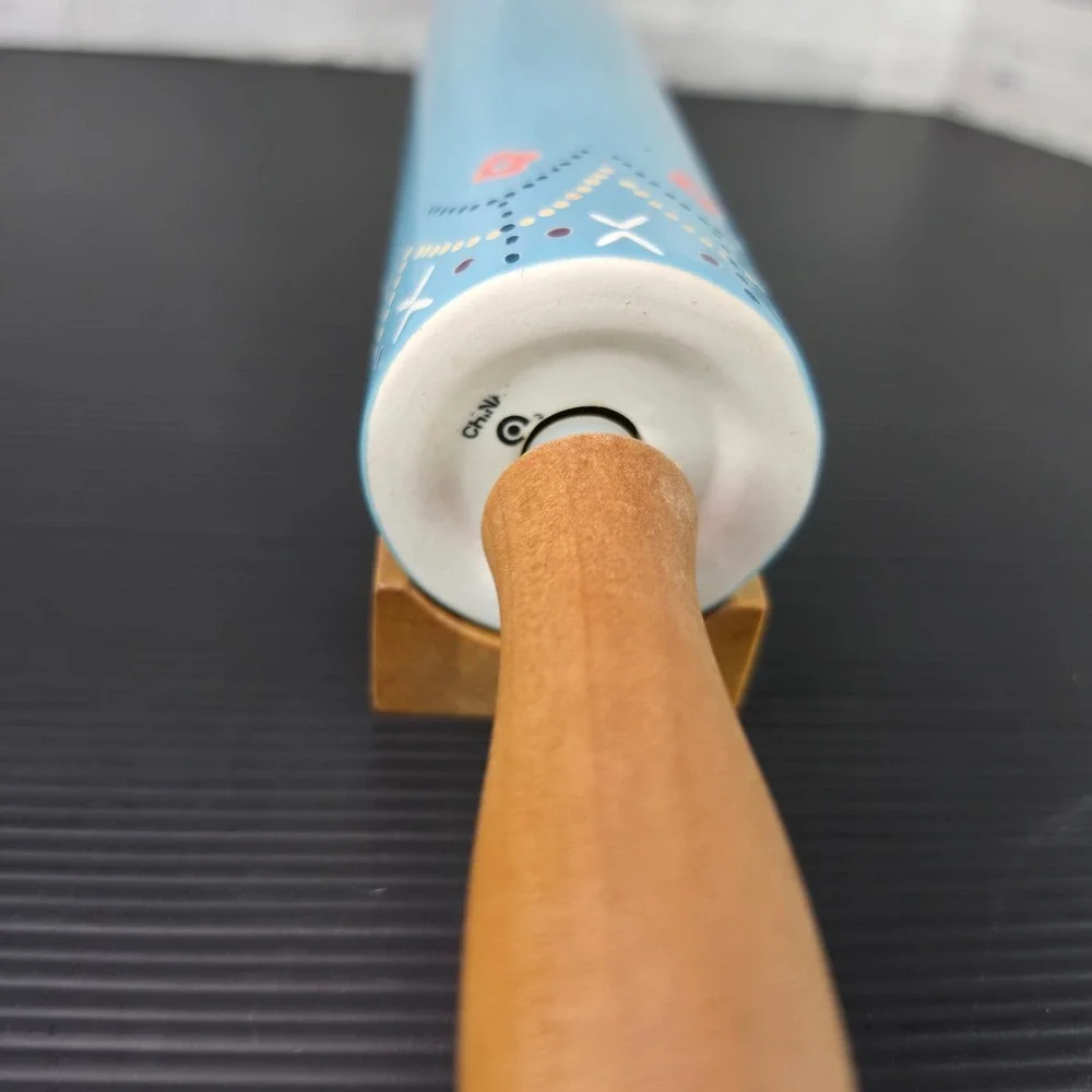 The Nordic Ceramic Rolling Pin Blue Floral with Wood Handles and Base